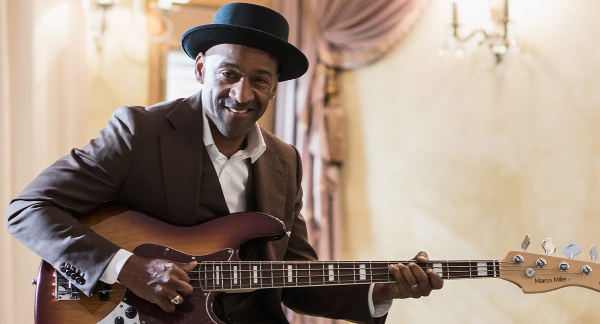 How did Sire and Marcus Miller come together?